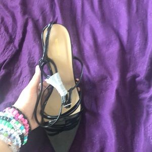 Black strappy point toe heels